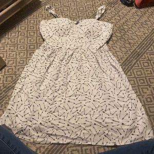 a white arrow dress.